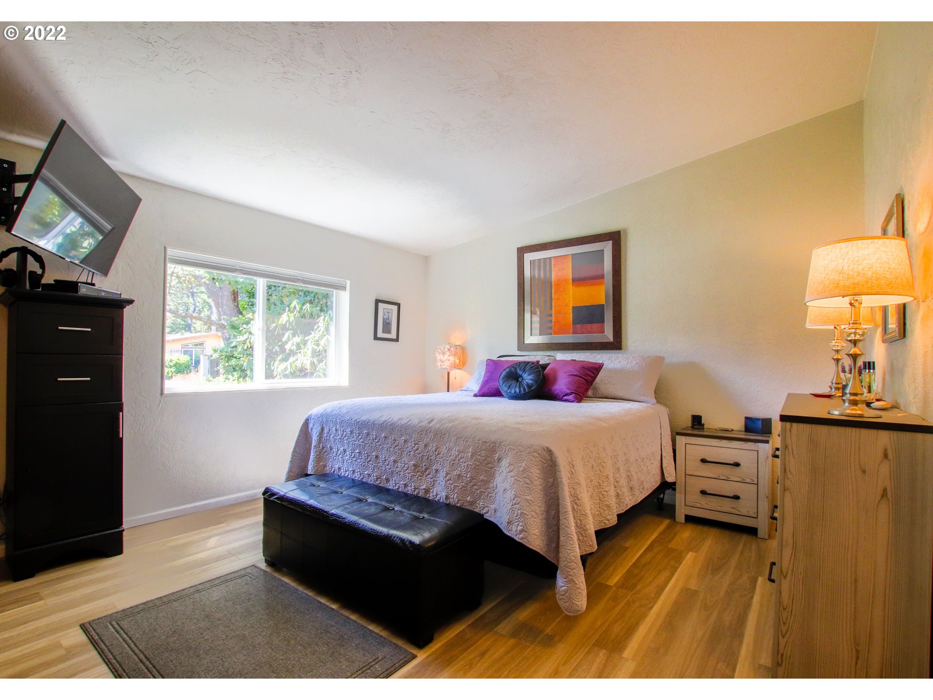2187 12th Street Florence, OR 97439 - Photo 19 of 30 a bedroom with a bed and window