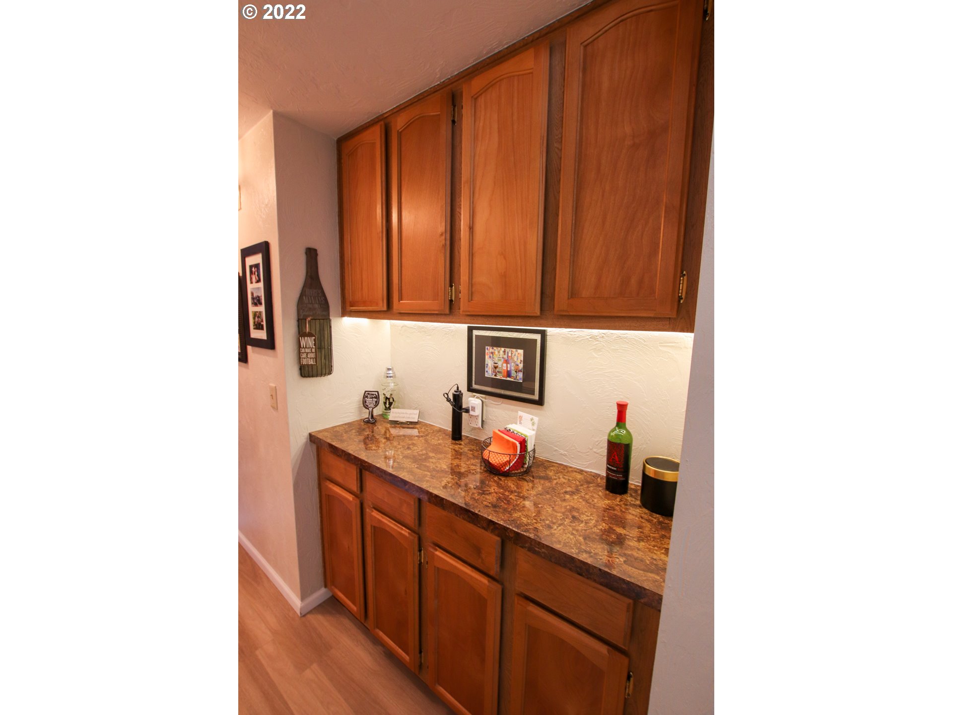 2187 12th Street Florence, OR 97439 - Photo 22 of 30 a kitchen with sink and cabinets