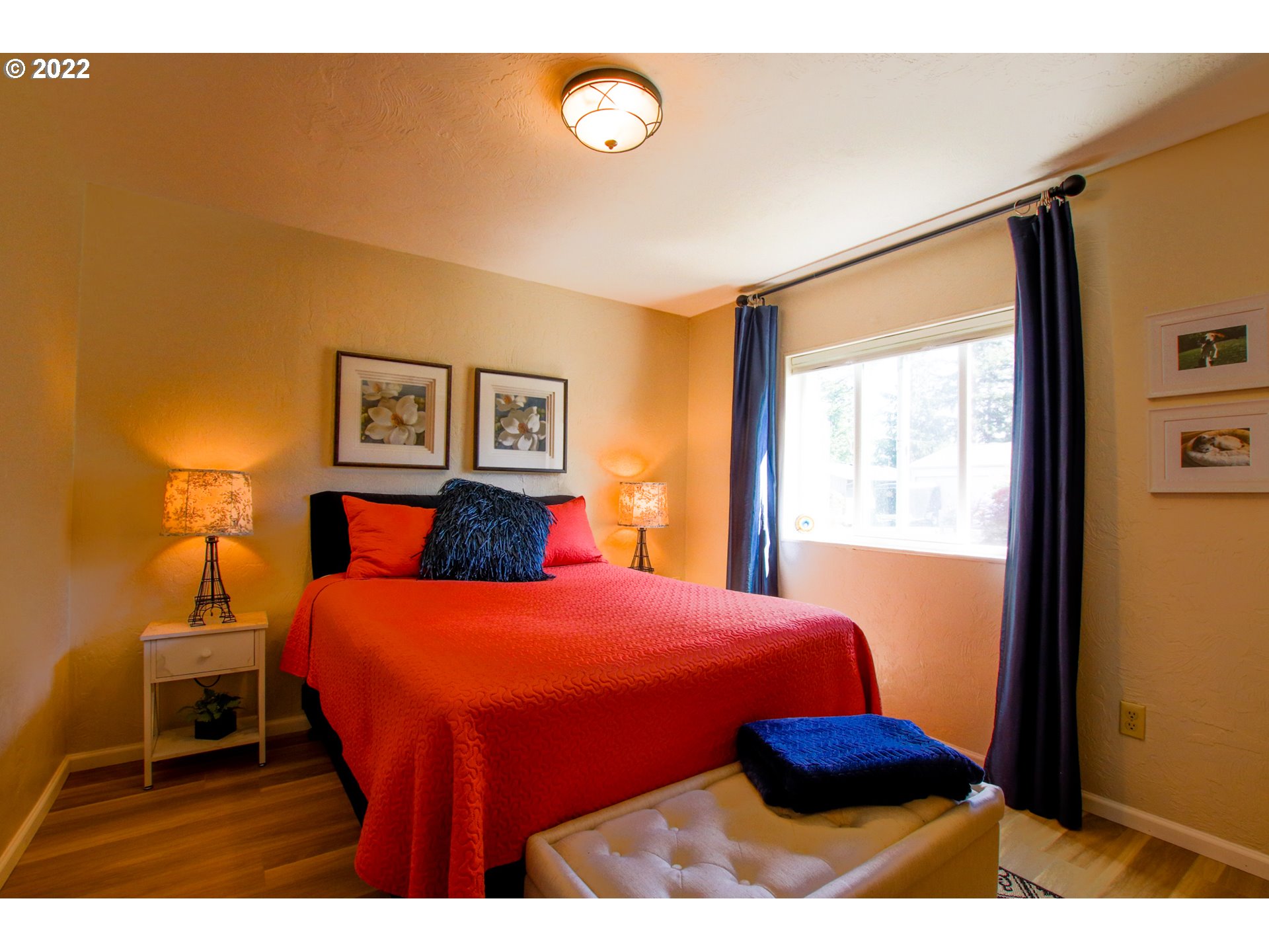 2187 12th Street Florence, OR 97439 - Photo 23 of 30 a bedroom with a bed and a view of bathroom