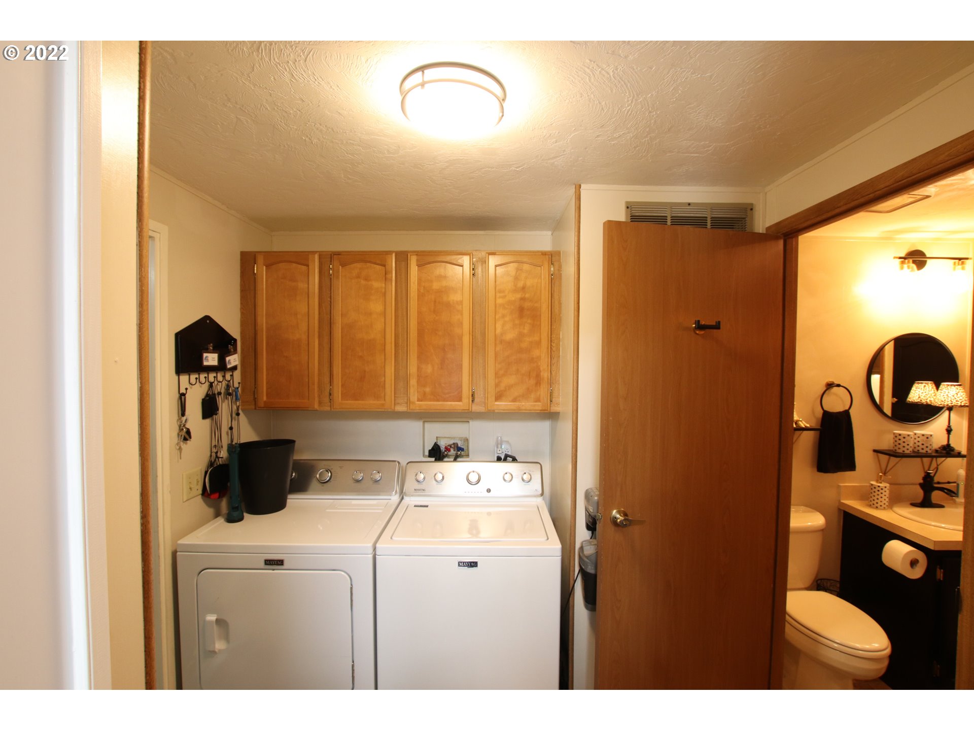 2187 12th Street Florence, OR 97439 - Photo 28 of 30 a utility room with dryer and washer
