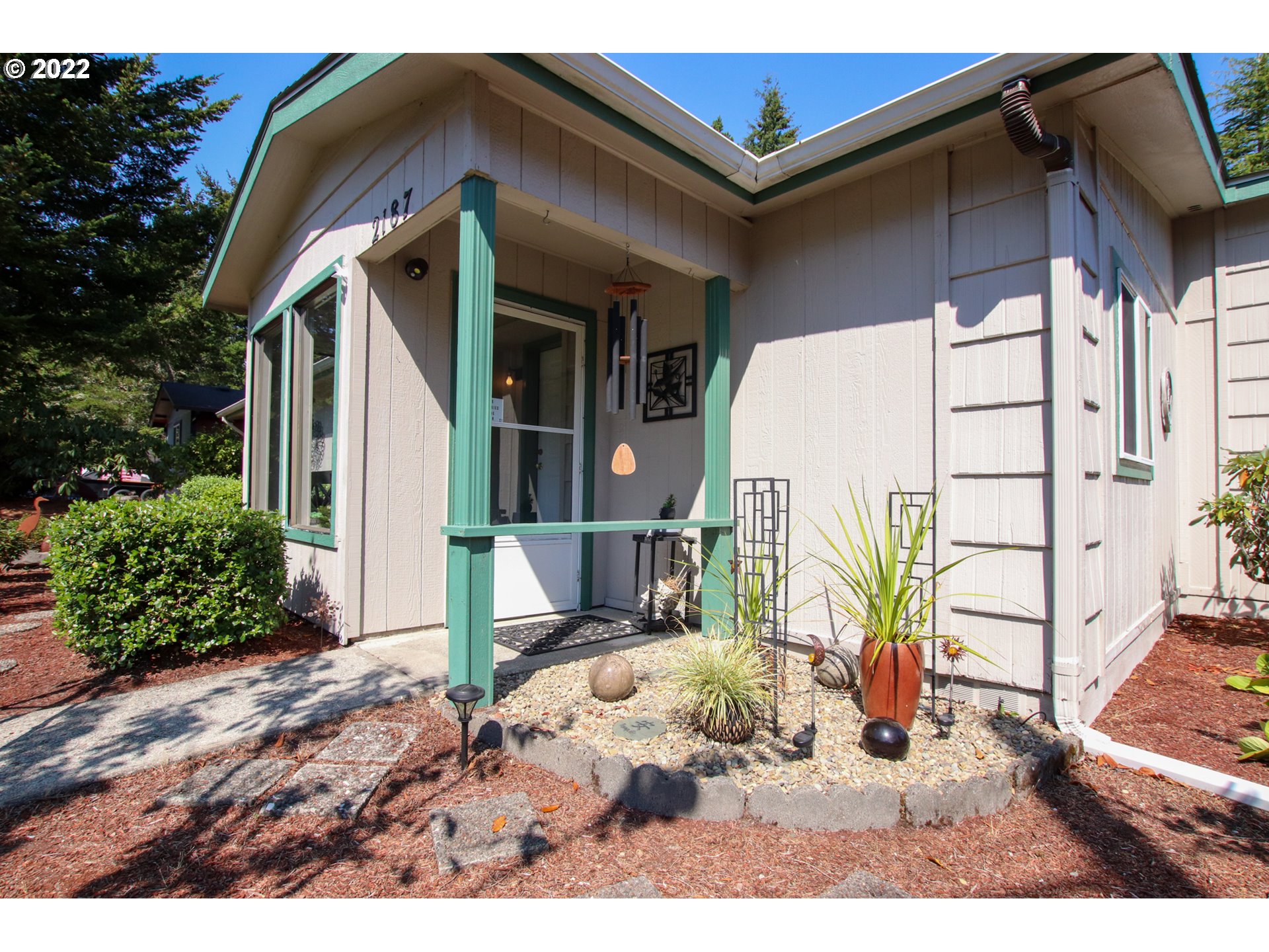 2187 12th Street Florence, OR 97439 - Photo 7 of 30 a view of a house with a wooden floor