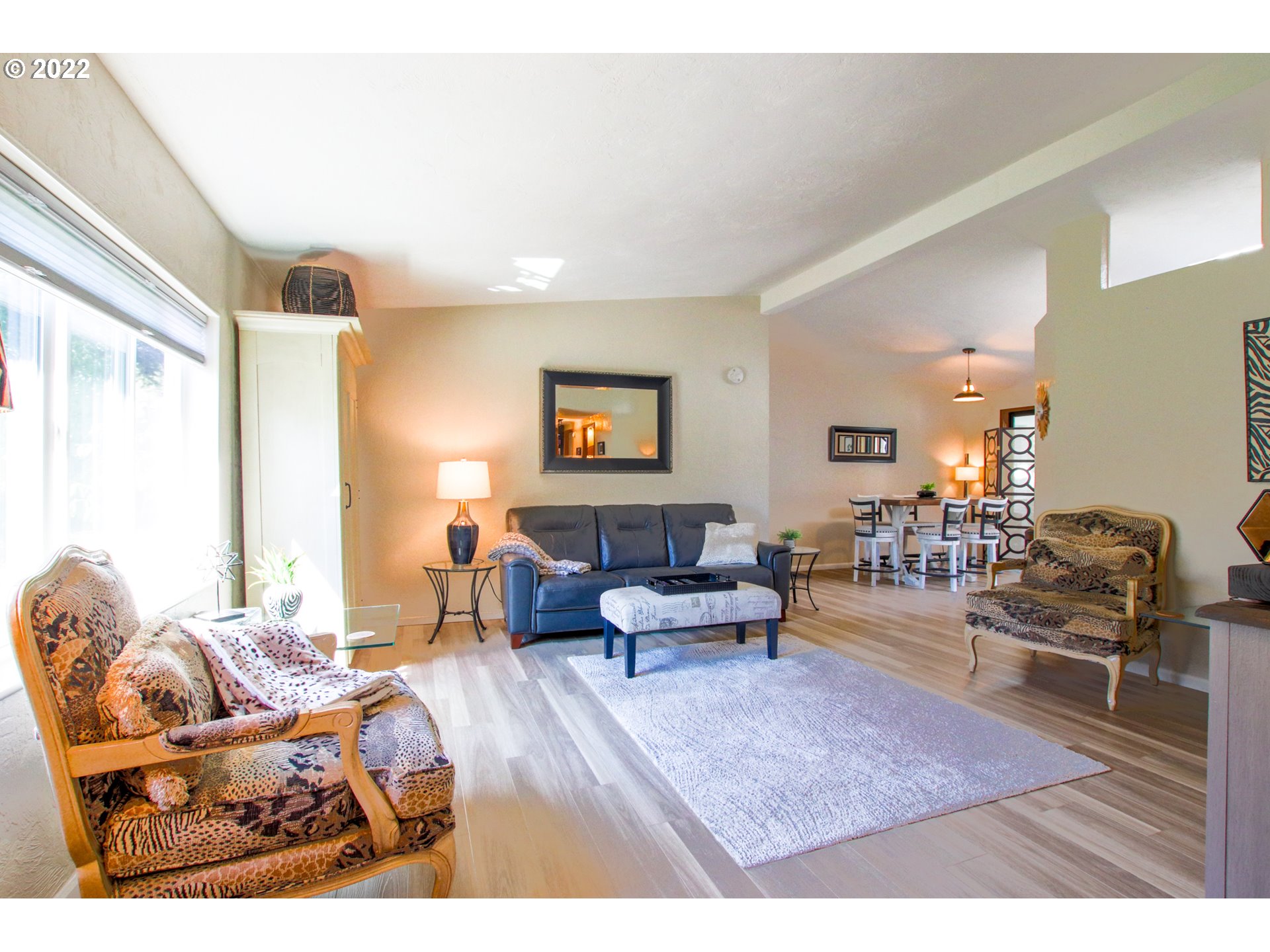 2187 12th Street Florence, OR 97439 - Photo 9 of 30 a living room with furniture and a wooden floor