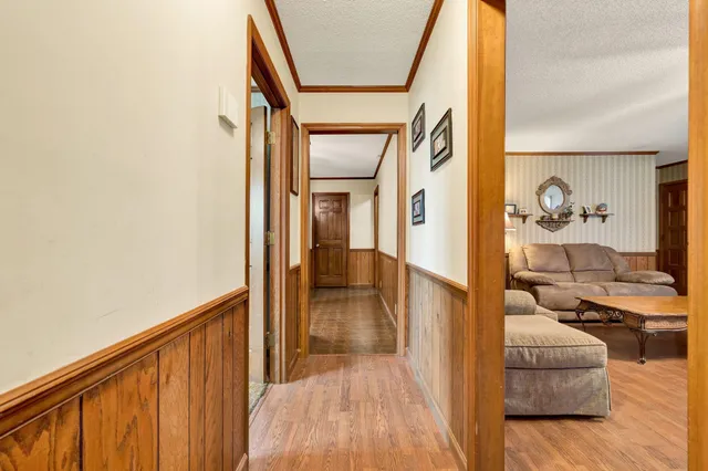 a bedroom with a bed and dresser