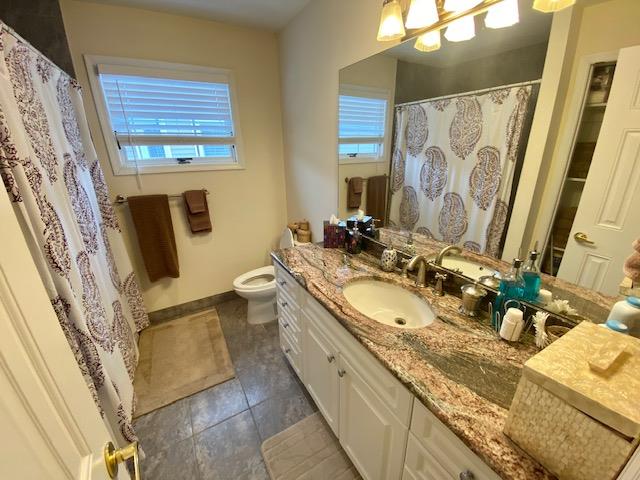 25 Lido Boulevard Point Lookout, NY 11569 - Photo 15 of 18 Bathroom featuring tile patterned flooring, vanity, and toilet