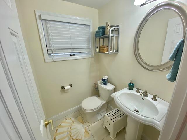 25 Lido Boulevard Point Lookout, NY 11569 - Photo 6 of 18 Bathroom with tile patterned flooring, toilet, and sink