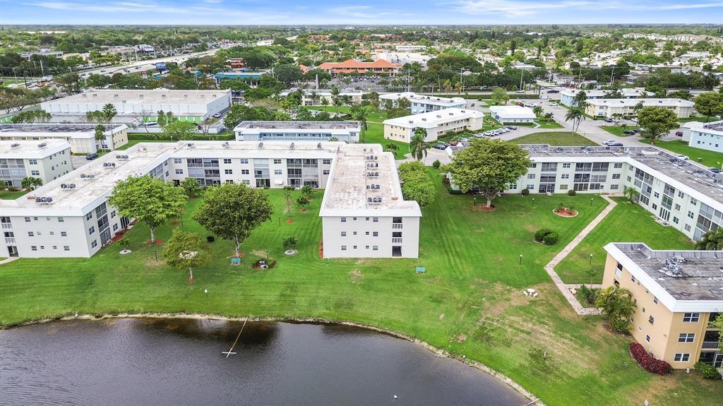 9780 Marina Boulevard, Unit 415 Boca Raton, FL 33428 - Photo 37 of 39 an aerial view of a house with a garden