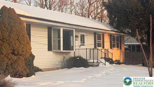 4059 Mauch Chunk Road Coplay, PA 18037 - Photo 17 of 37 a view of a house with a snow