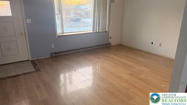 4059 Mauch Chunk Road Coplay, PA 18037 - Photo 2 of 37 an empty room with windows