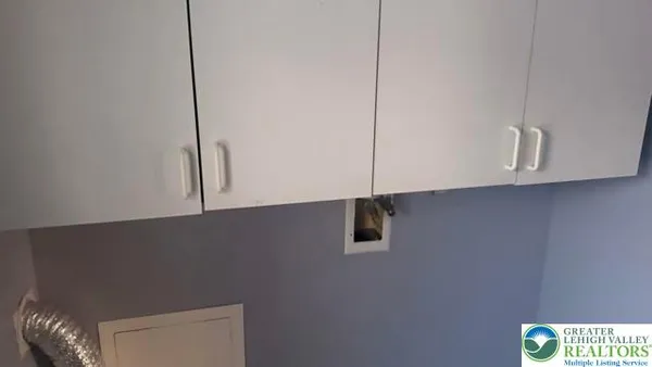a bathroom with a shower and toilet