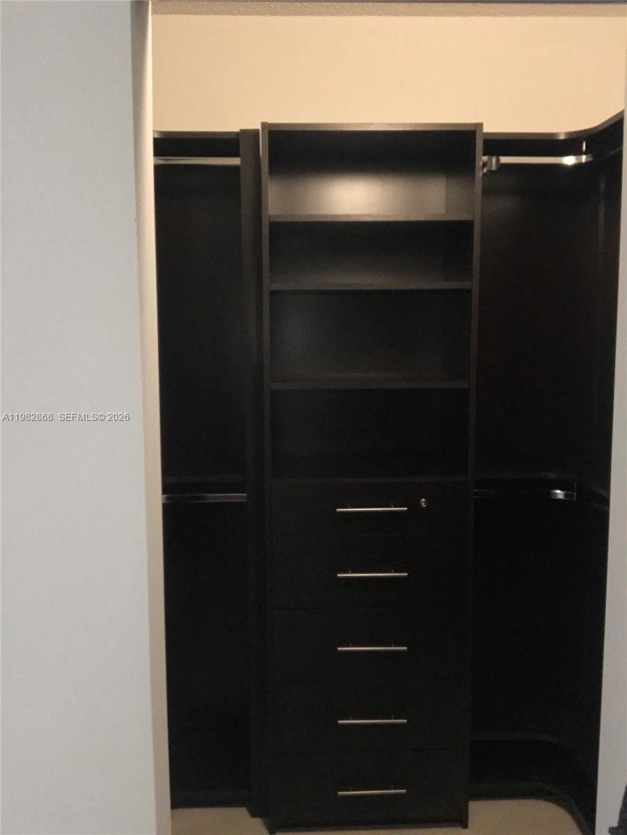 701 Brickell Key Boulevard, Unit 910 Miami, FL 33131 - Photo 12 of 30 a view of walk in closet