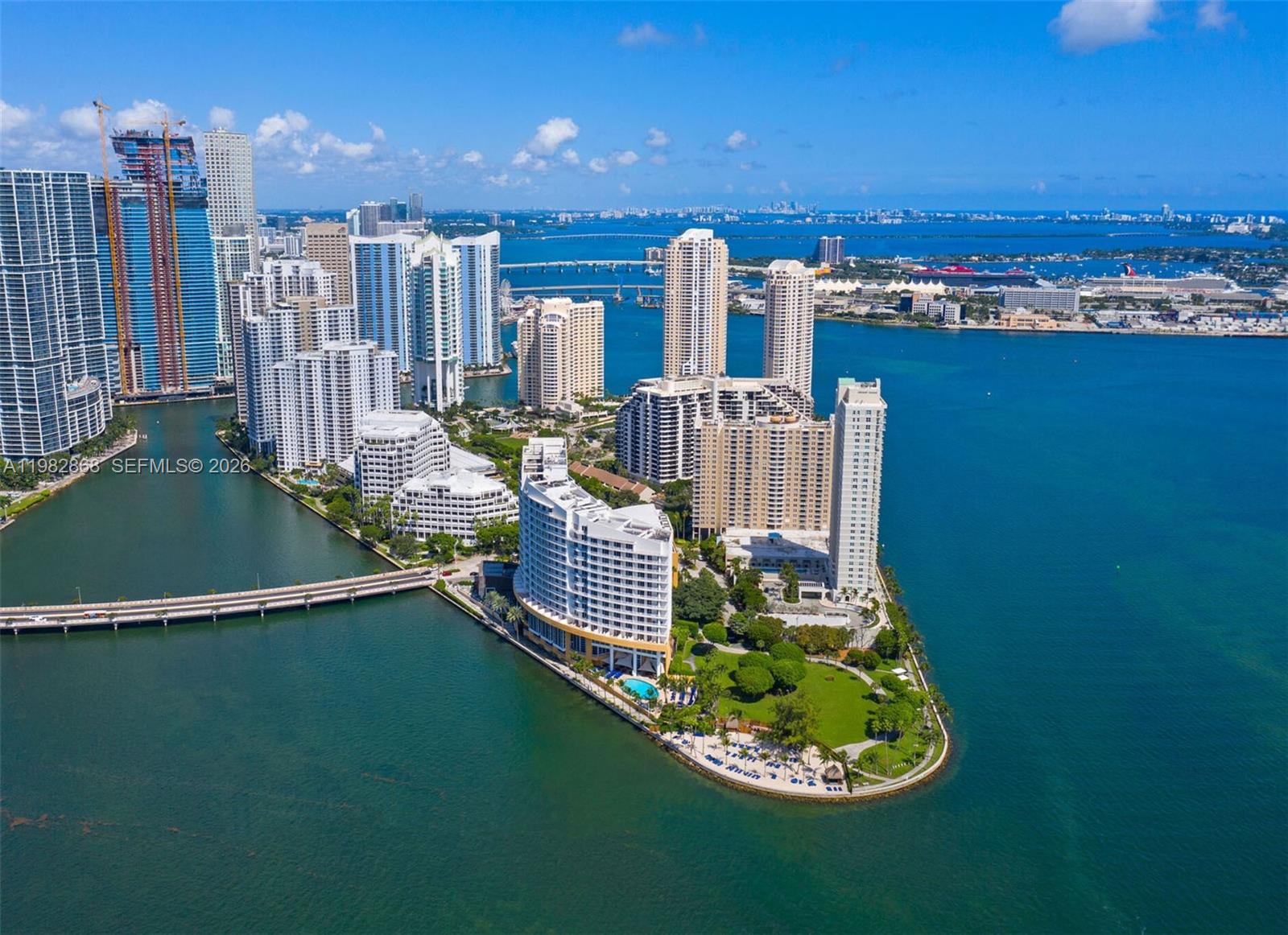 701 Brickell Key Boulevard, Unit 910 Miami, FL 33131 - Photo 30 of 30 a view of a balcony with chairs