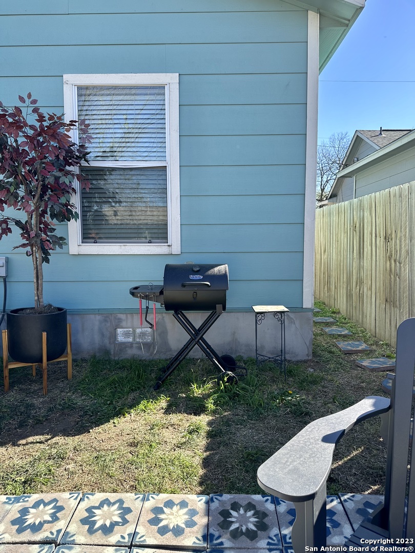 223 Rudolph San Antonio, TX 78202 - Photo 17 of 24 a view of a backyard with table and chairs and potted plants