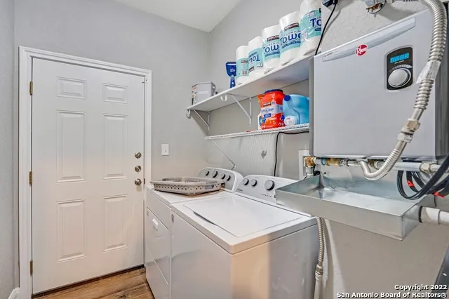 a utility room with dryer and washer