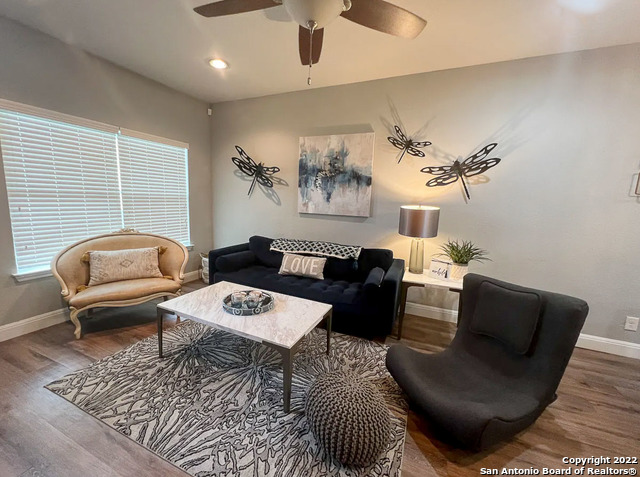 223 Rudolph San Antonio, TX 78202 - Photo 6 of 24 a living room with furniture a rug and a chandelier