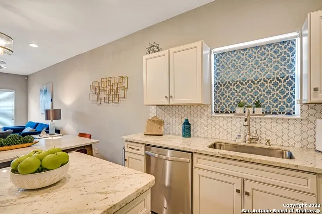 a room with a sink and a cabinets