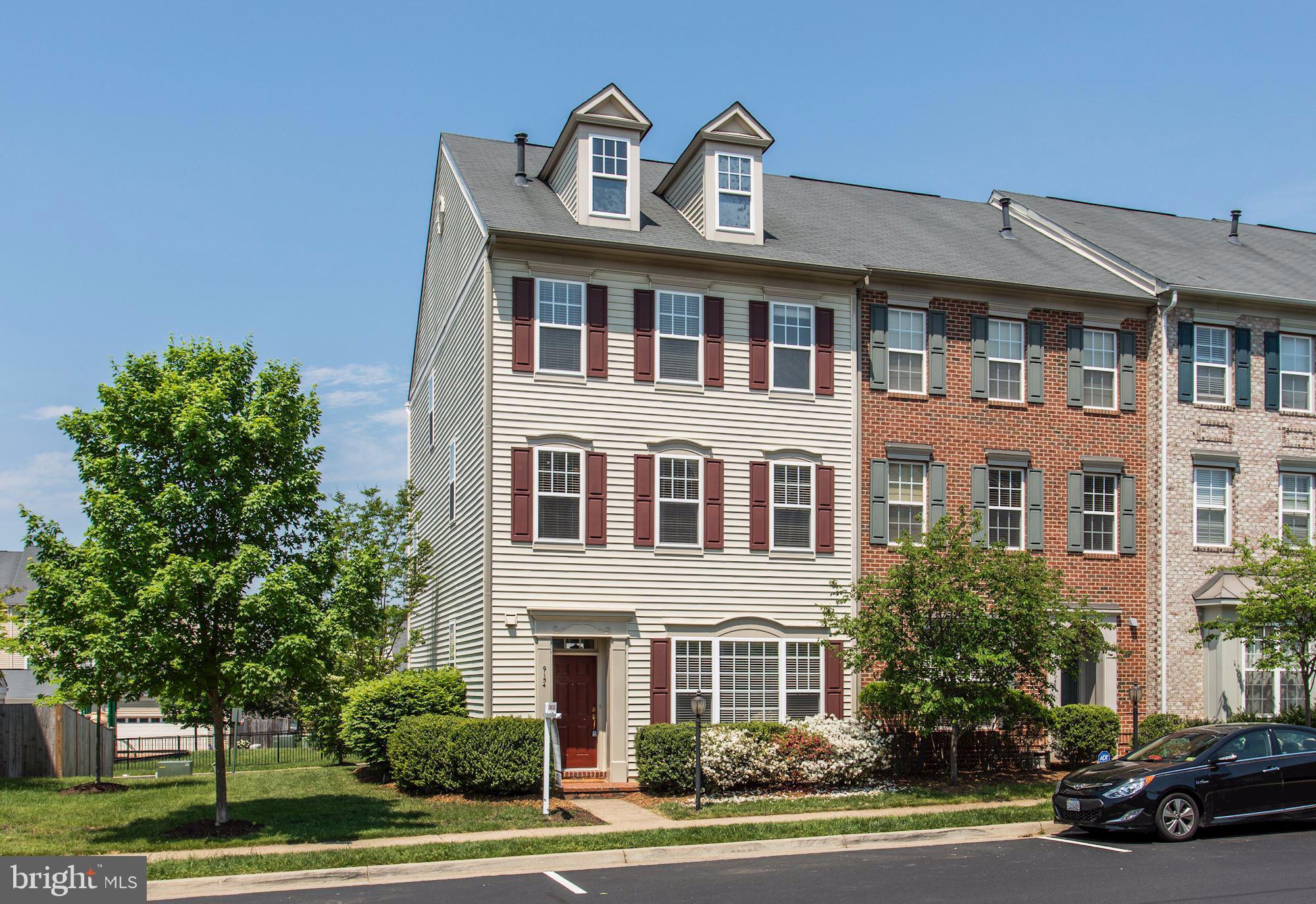 9154 Ribbon Falls Loop Bristow, VA 20136 - Photo 1 of 32 End Unit Miller & Smith Grand Regents model!