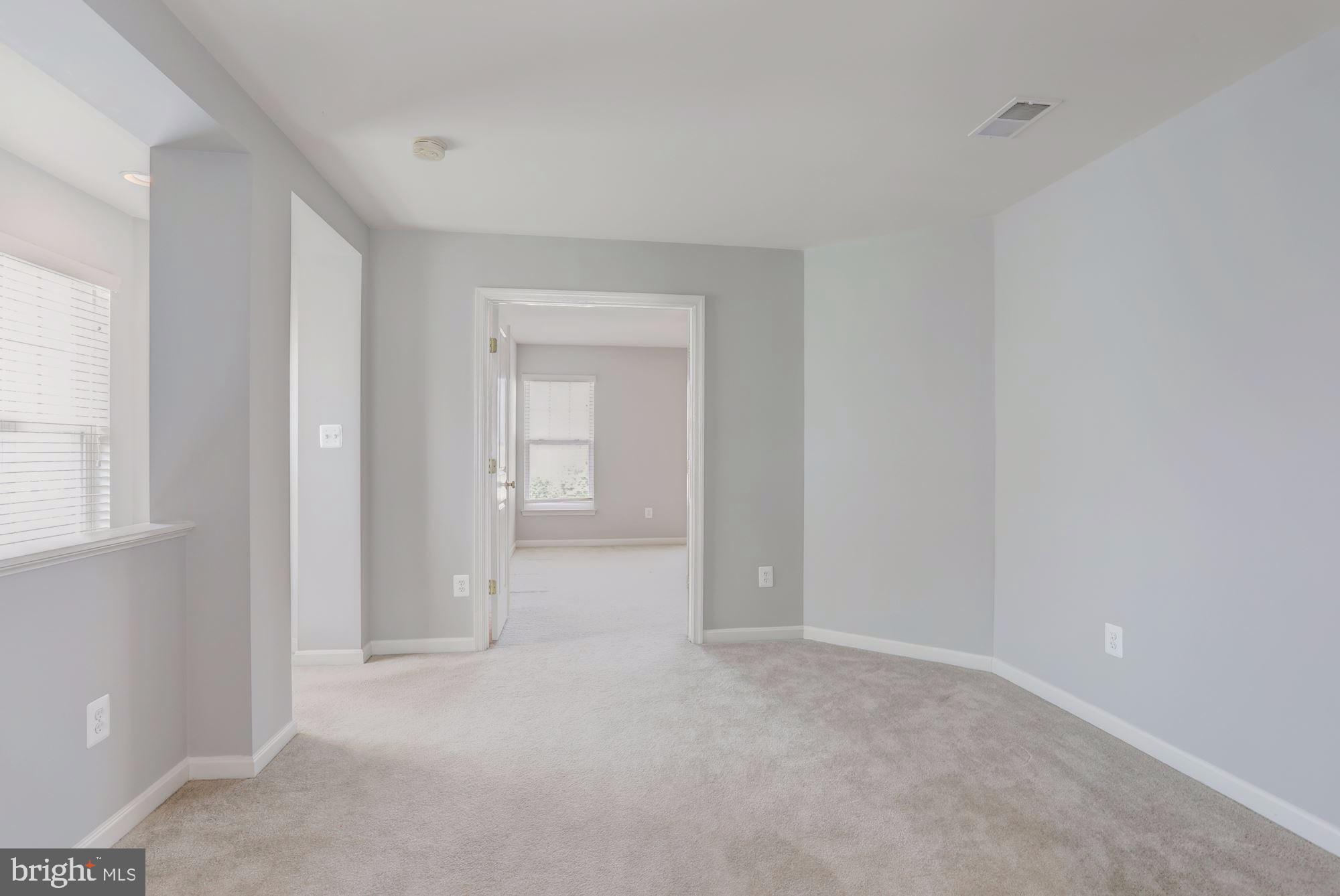 9154 Ribbon Falls Loop Bristow, VA 20136 - Photo 18 of 32 Loft area.
