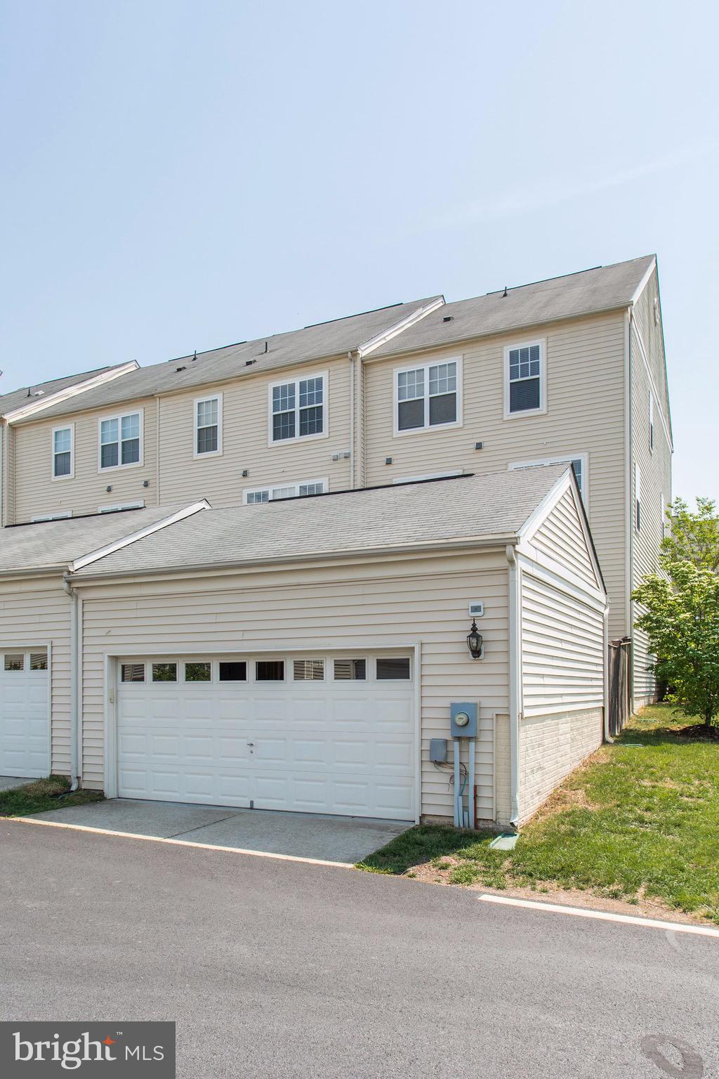 9154 Ribbon Falls Loop Bristow, VA 20136 - Photo 21 of 32 Two car garage.