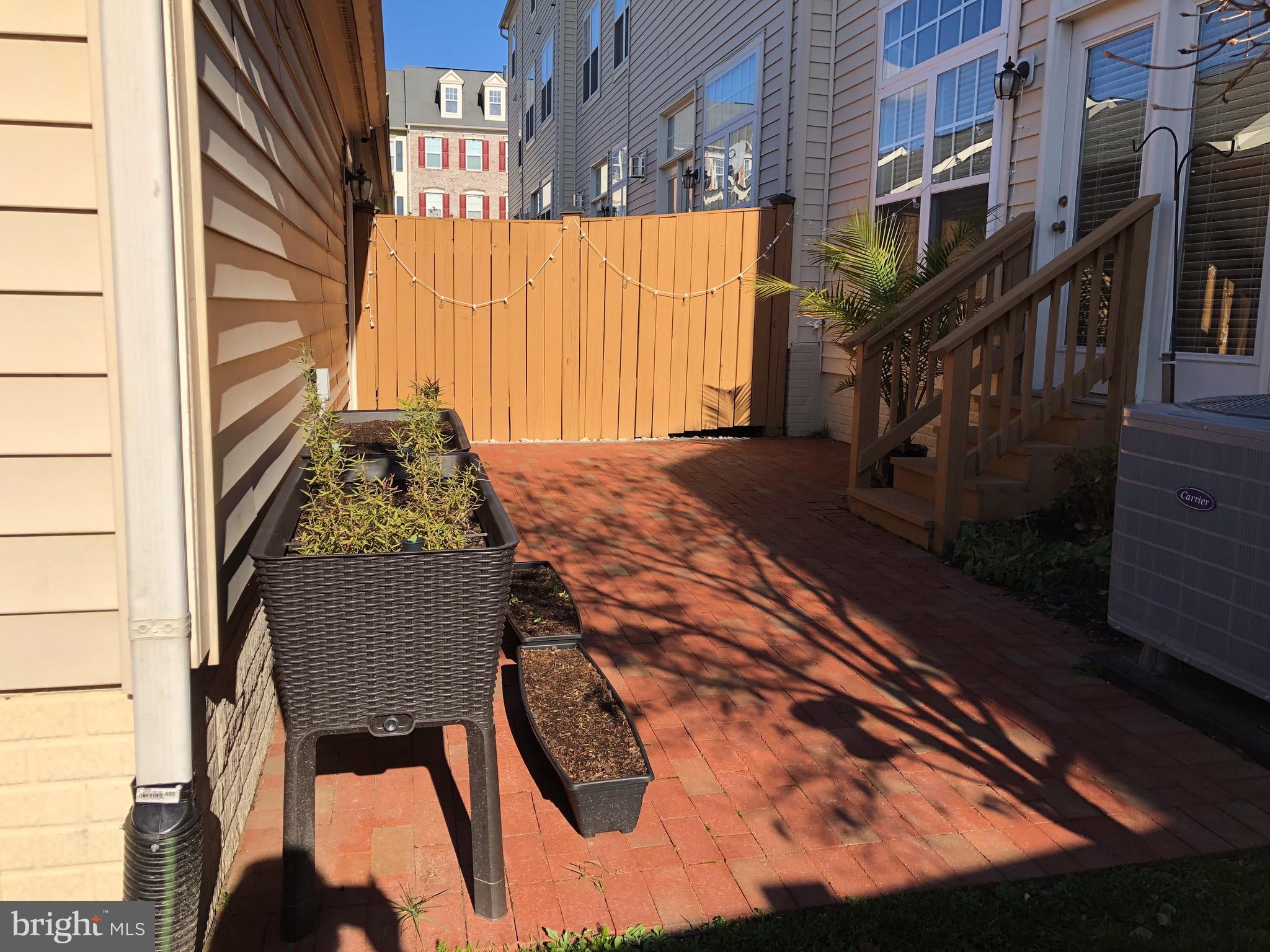 9154 Ribbon Falls Loop Bristow, VA 20136 - Photo 23 of 32 NewBrick Patio!
