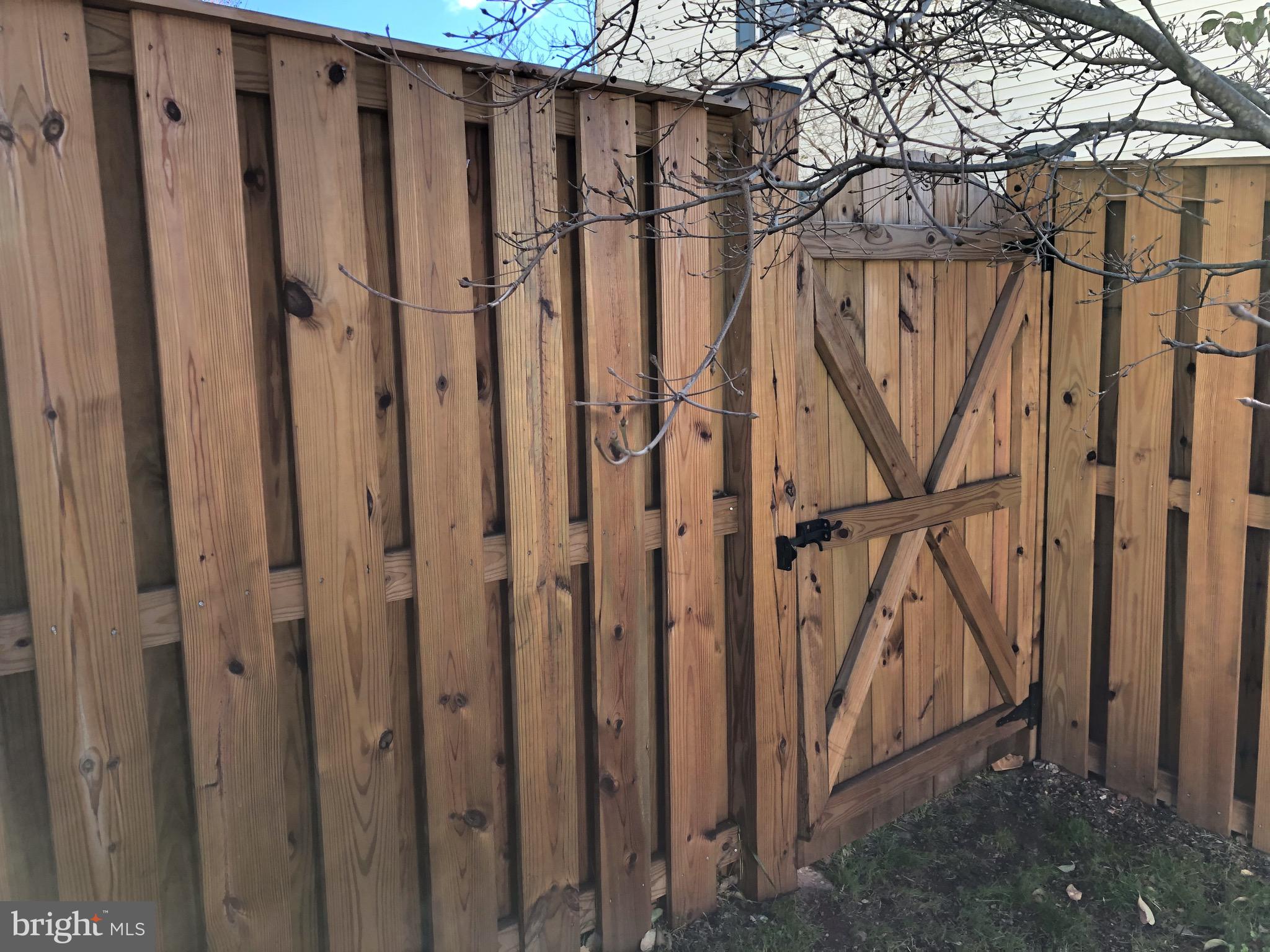 9154 Ribbon Falls Loop Bristow, VA 20136 - Photo 24 of 32 Gate large enough for lawnmowers!