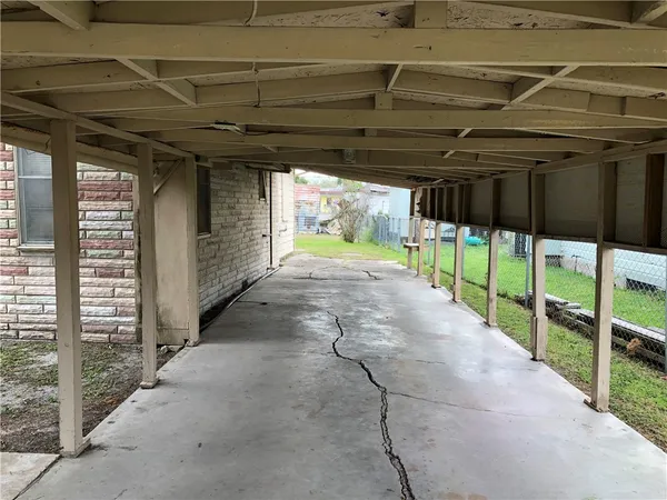 a view of living room with furniture and flat screen tv