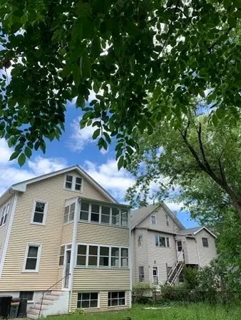a house view with a garden space