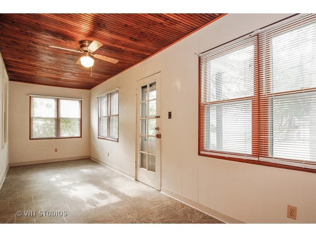 122 Eagle Point Road Fox Lake, IL 60020 - Photo 2 of 11 a view of an empty room with a window