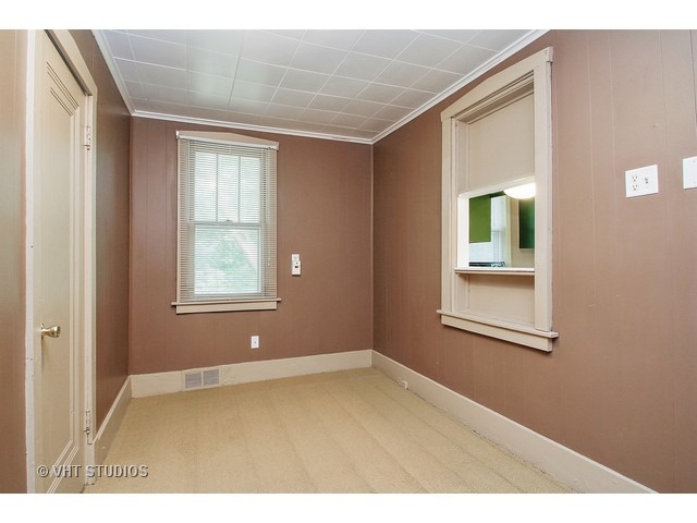 122 Eagle Point Road Fox Lake, IL 60020 - Photo 4 of 11 a view of an empty room with a window