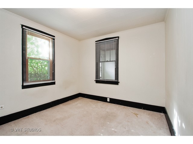 122 Eagle Point Road Fox Lake, IL 60020 - Photo 6 of 11 a view of an empty room with a window