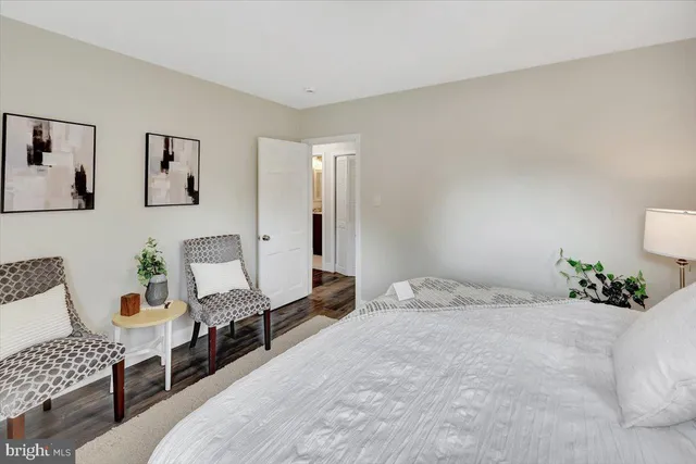 a bedroom with a bed and furniture