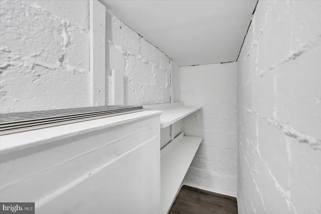 a view of a hallway with stairs