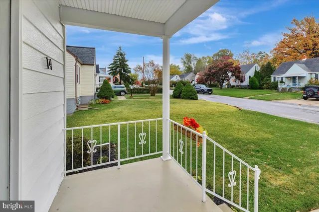 a view of a porch and garden