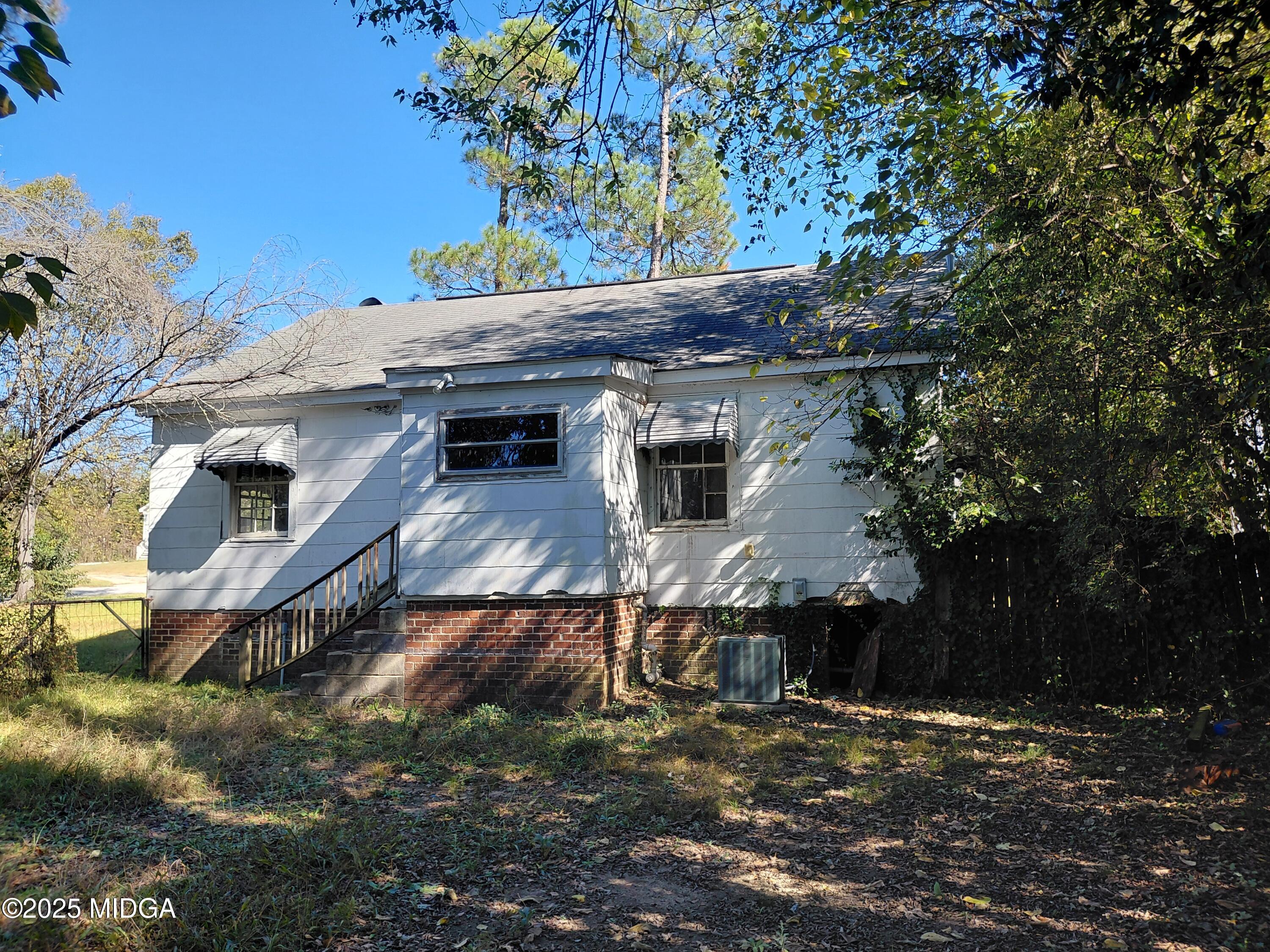 3811 Lyons Street Macon, GA 31206 - Photo 13 of 14 a view of a house with a yard