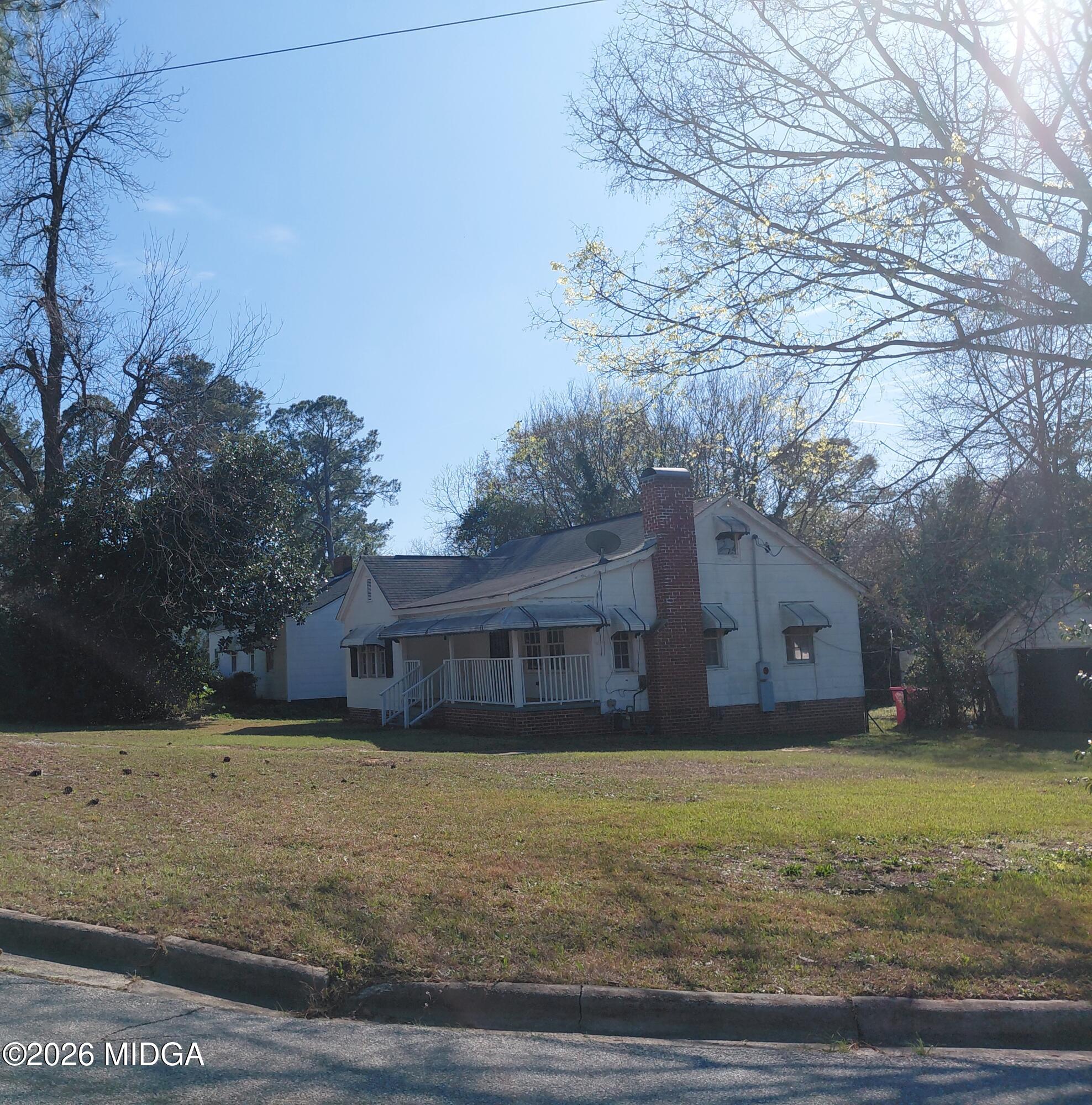 3811 Lyons Street Macon, GA 31206 - Photo 14 of 14 a view of house with a yard