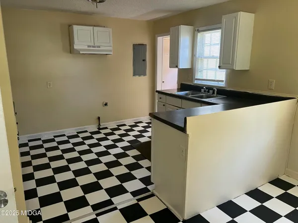 a black and white checkered floor