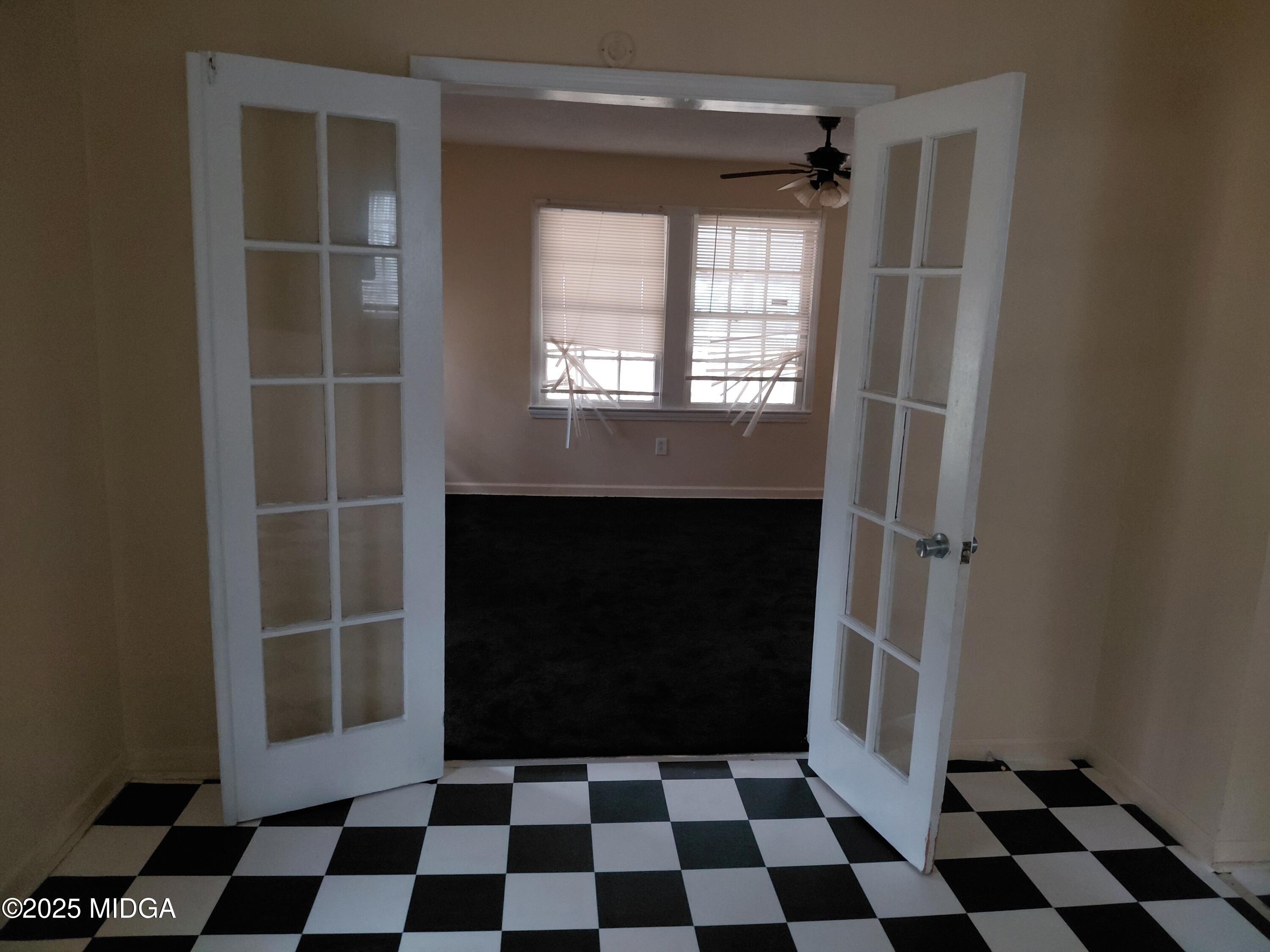 3811 Lyons Street Macon, GA 31206 - Photo 3 of 14 a black and white checkered floor