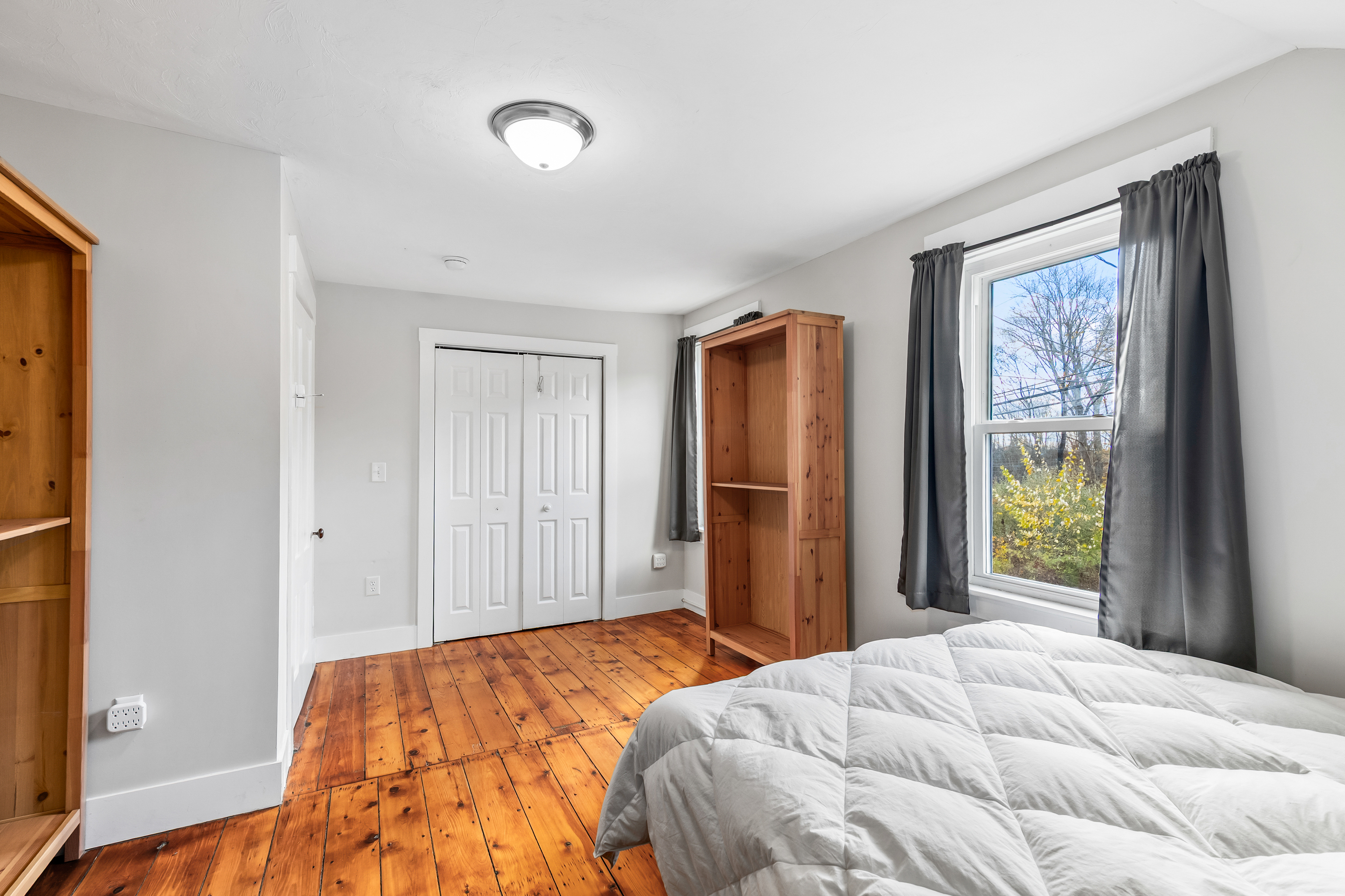 290 Providence Pike Putnam, CT 06260 - Photo 17 of 34 a bedroom with a bed and a window