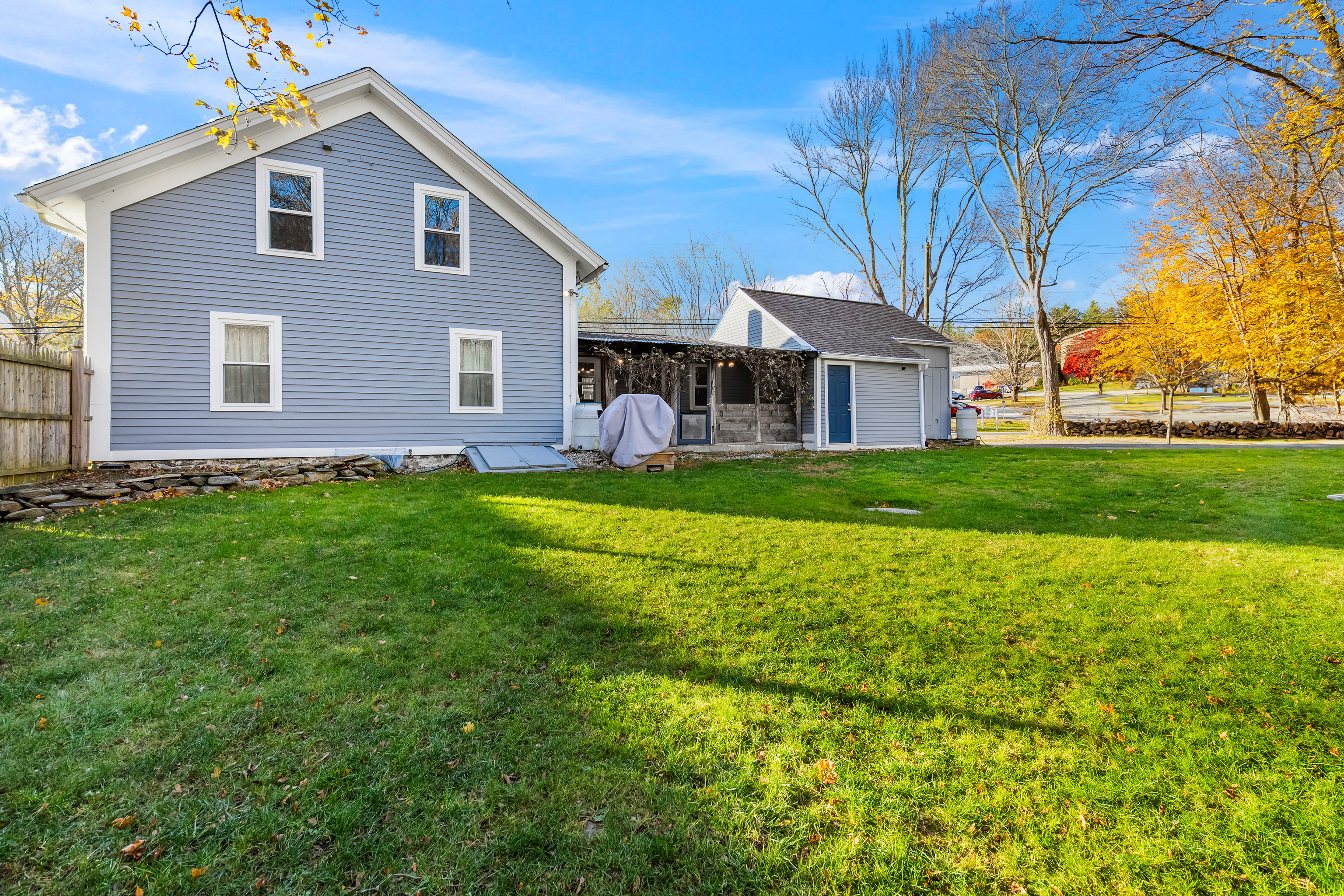 290 Providence Pike Putnam, CT 06260 - Photo 25 of 34 a view of a yard in front of a house with a large tree