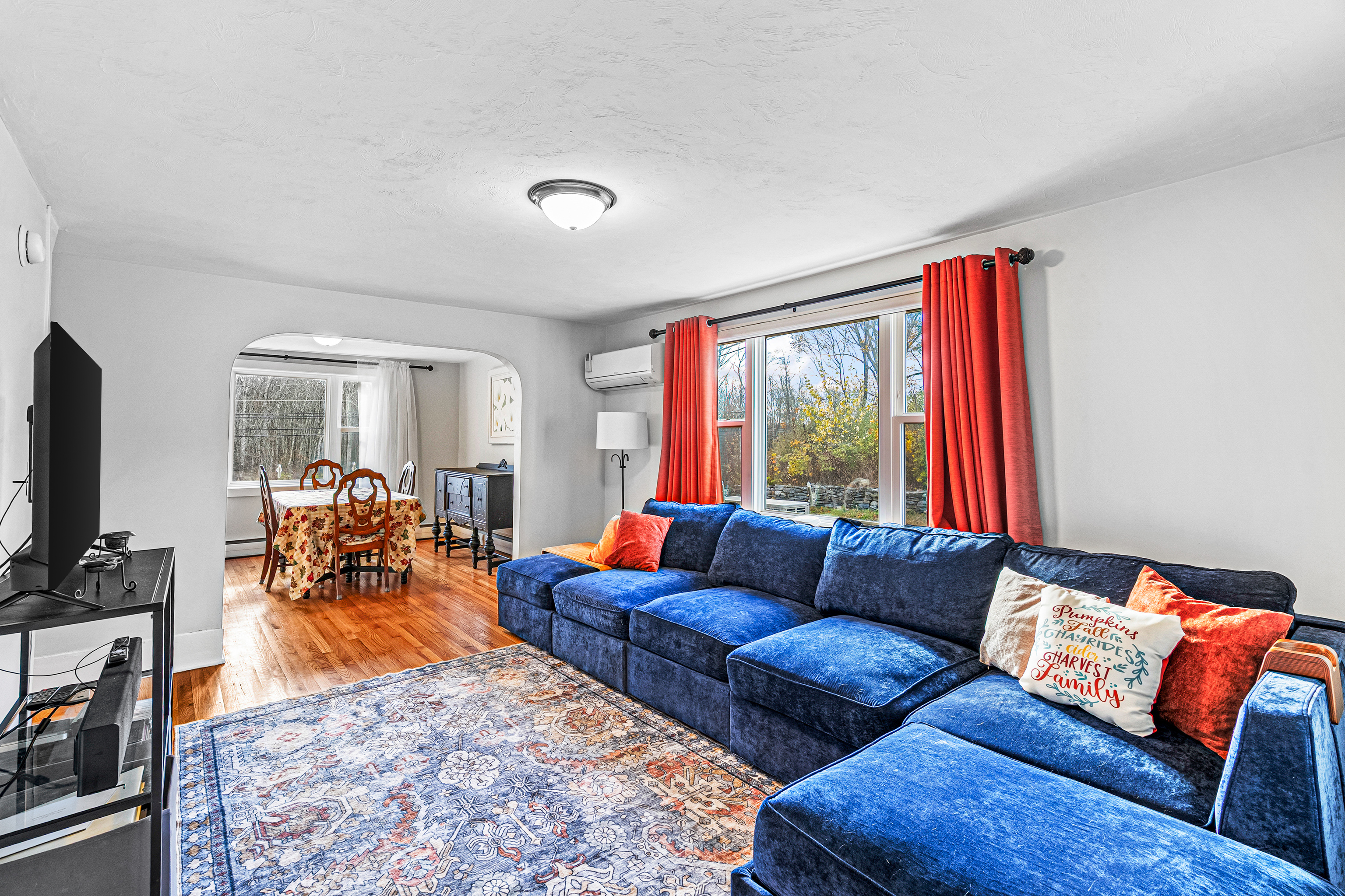 290 Providence Pike Putnam, CT 06260 - Photo 7 of 34 a living room with furniture and a flat screen tv