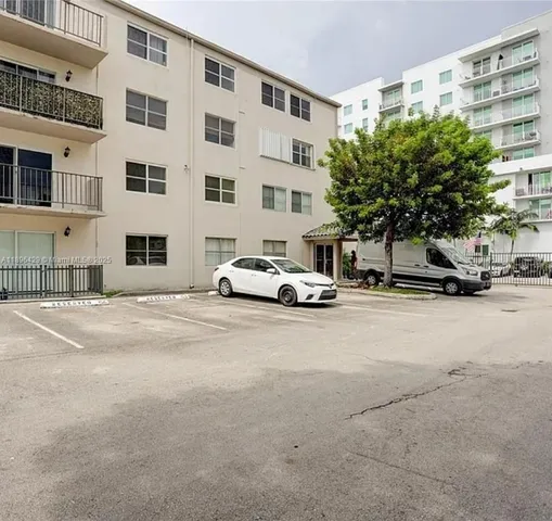 a car parked in front of a building