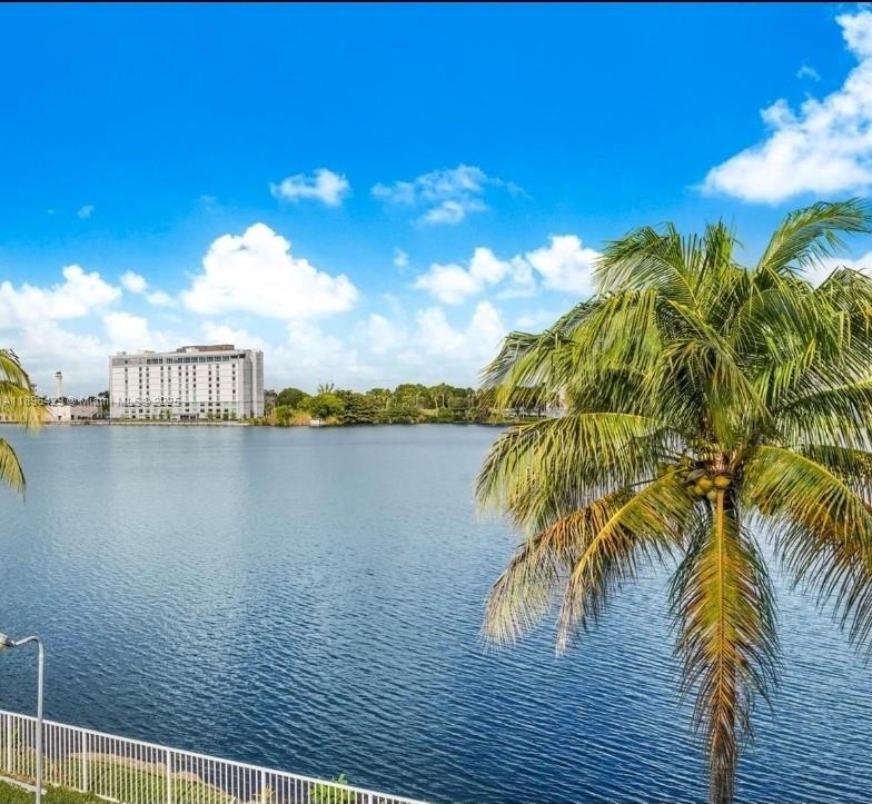 5501 Northwest 7th Street, Unit E408 Miami, FL 33126 - Photo 24 of 27 a view of a lake