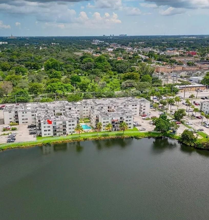 5501 Northwest 7th Street, Unit E408 Miami, FL 33126 - Photo 25 of 27 a view of outdoor space and yard