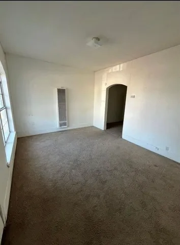 a view of a livingroom and a window