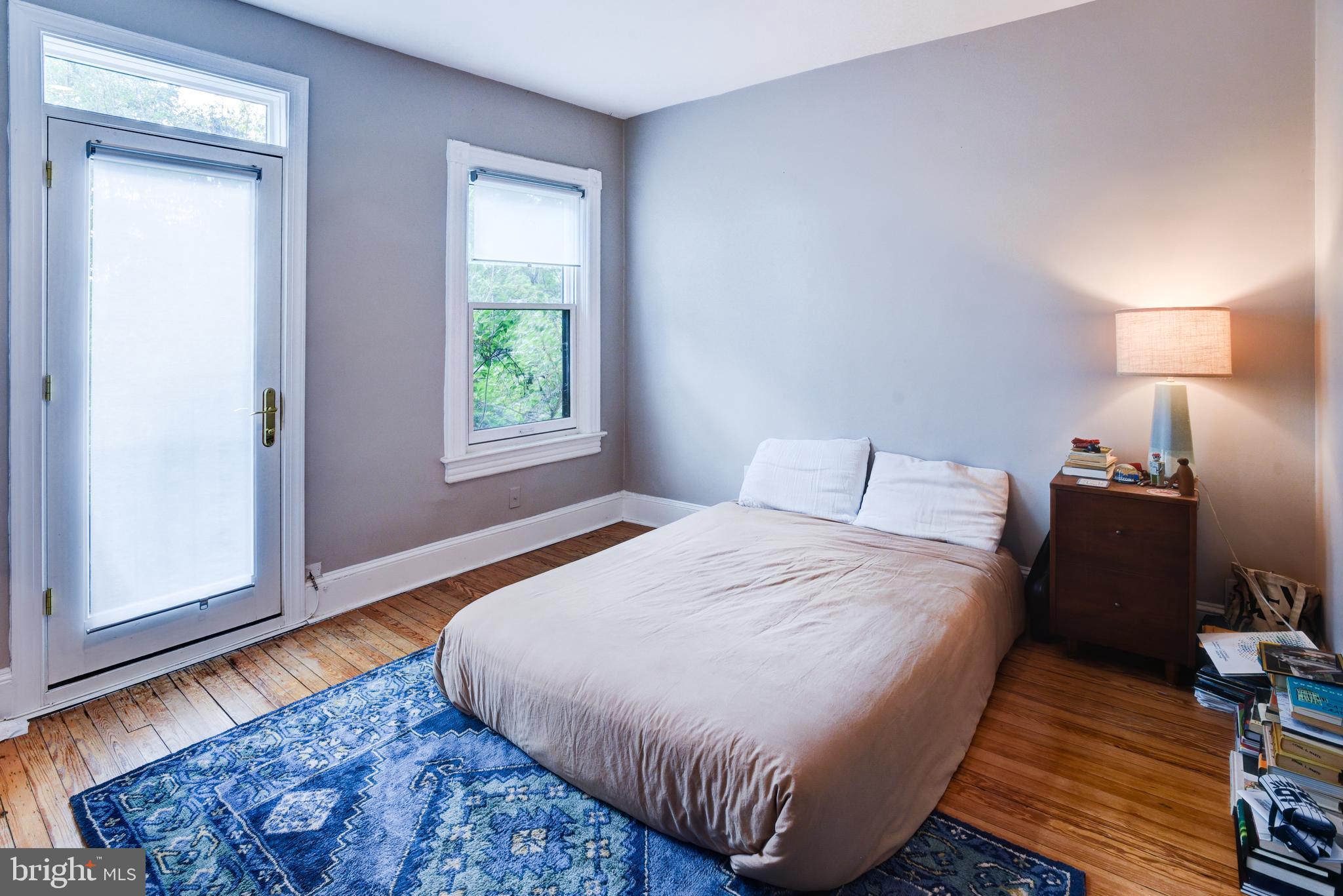 3026 R Street Northwest, Unit 2 Washington, DC 20007 - Photo 27 of 45 a bedroom with bed and window