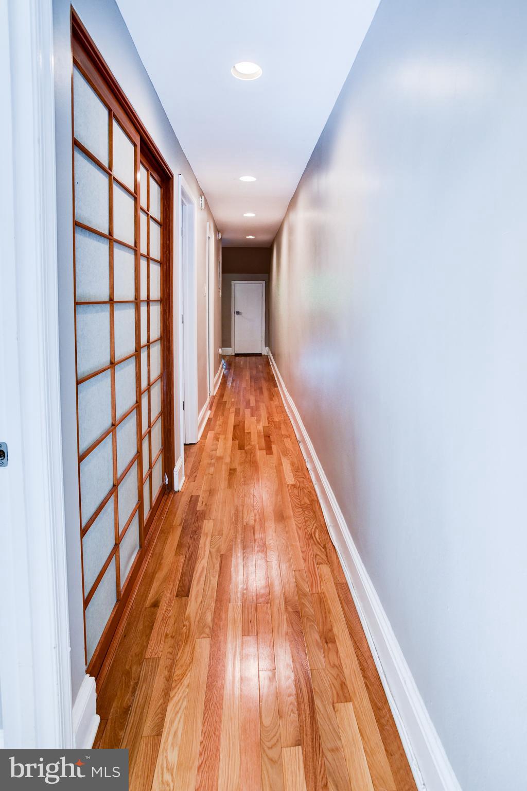 3026 R Street Northwest, Unit 2 Washington, DC 20007 - Photo 32 of 45 a view of hallway with wooden floor
