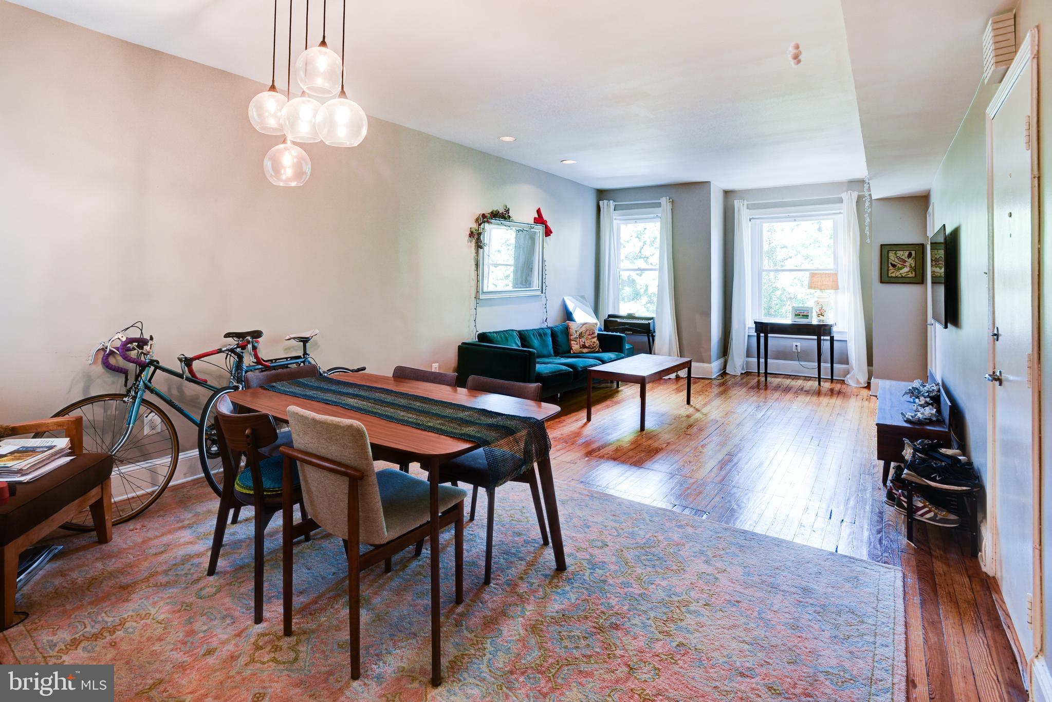 3026 R Street Northwest, Unit 2 Washington, DC 20007 - Photo 7 of 45 a view of a dining room with furniture and wooden floor