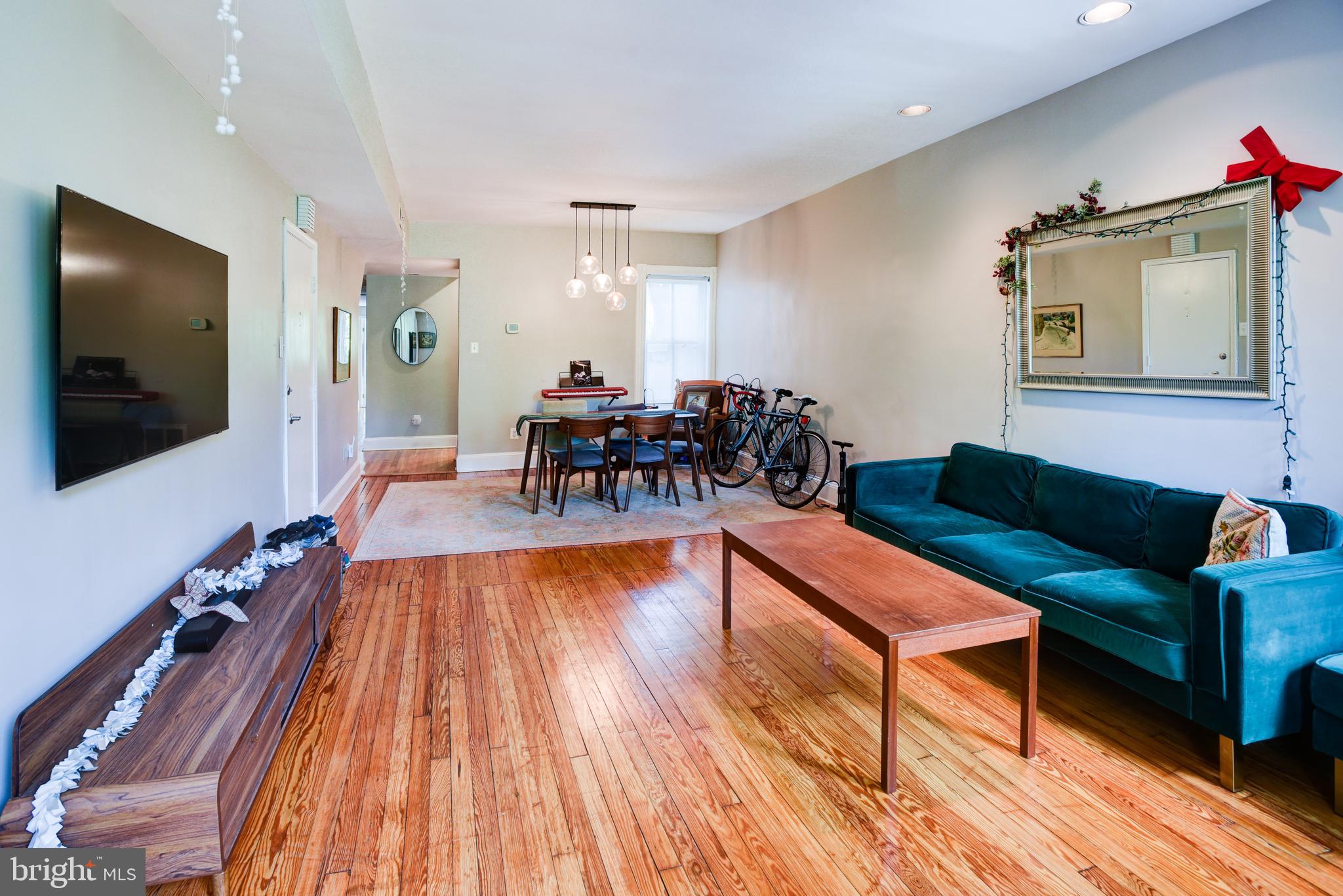 3026 R Street Northwest, Unit 2 Washington, DC 20007 - Photo 8 of 45 a living room with furniture and a flat screen tv