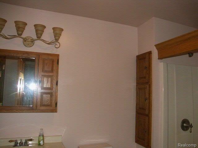 5303 Walker Road North Street, MI 48049 - Photo 7 of 15 1st fl. bath