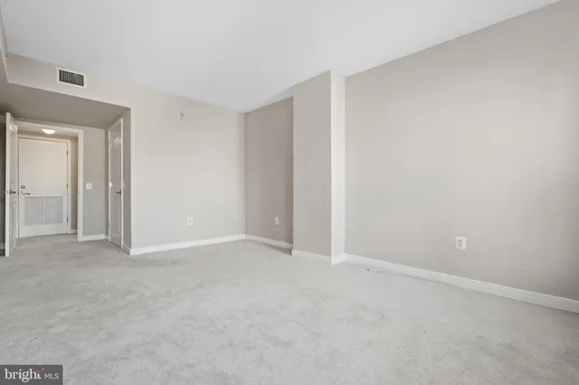 a view of a building with sitting area