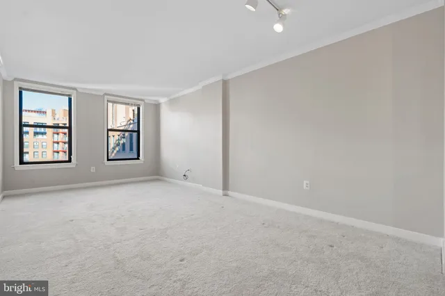 a view of a kitchen with a sink